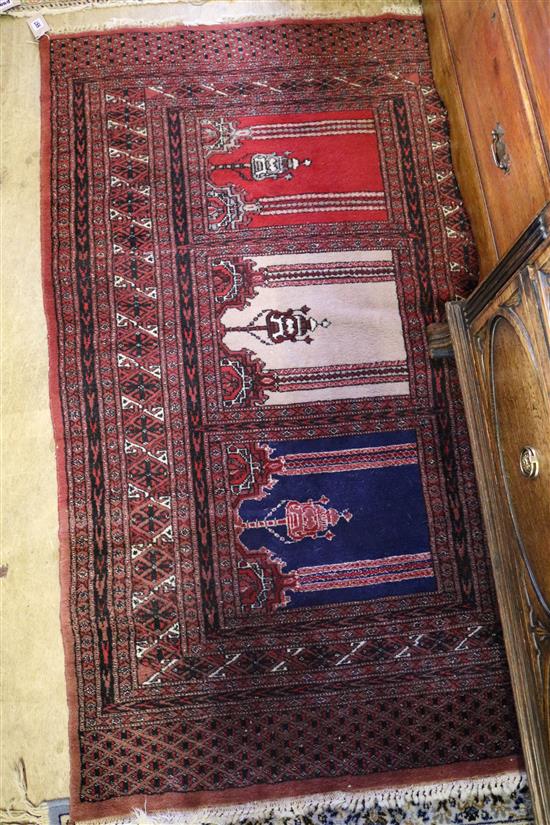 Red ground prayer rug